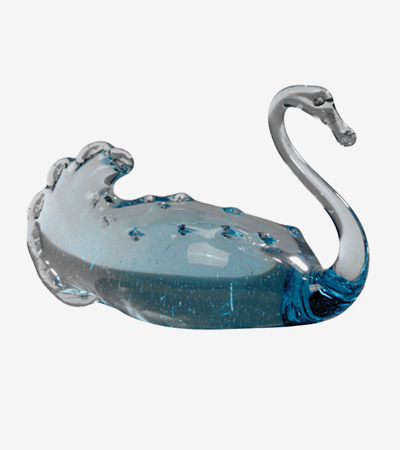 Glass swan with a slender curved neck and chunky body. The glass is clear on the neck but has a blue tinge for the body.