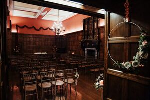 The Jacobean-inspired ballroom with chairs laud out for a ceremony