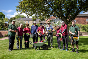 A group of volunteers maintaining the grounds at Cannon Hall. 