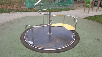 A wheelchair accessible roundabout in our playpark.